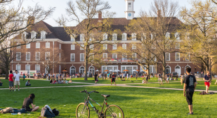 College students on lawn outside of campus building