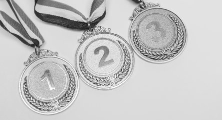 First, second, and third place medals