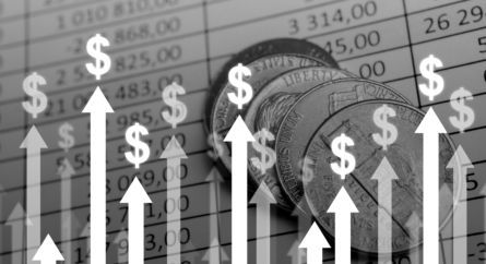 Financial chart with coins and arrows